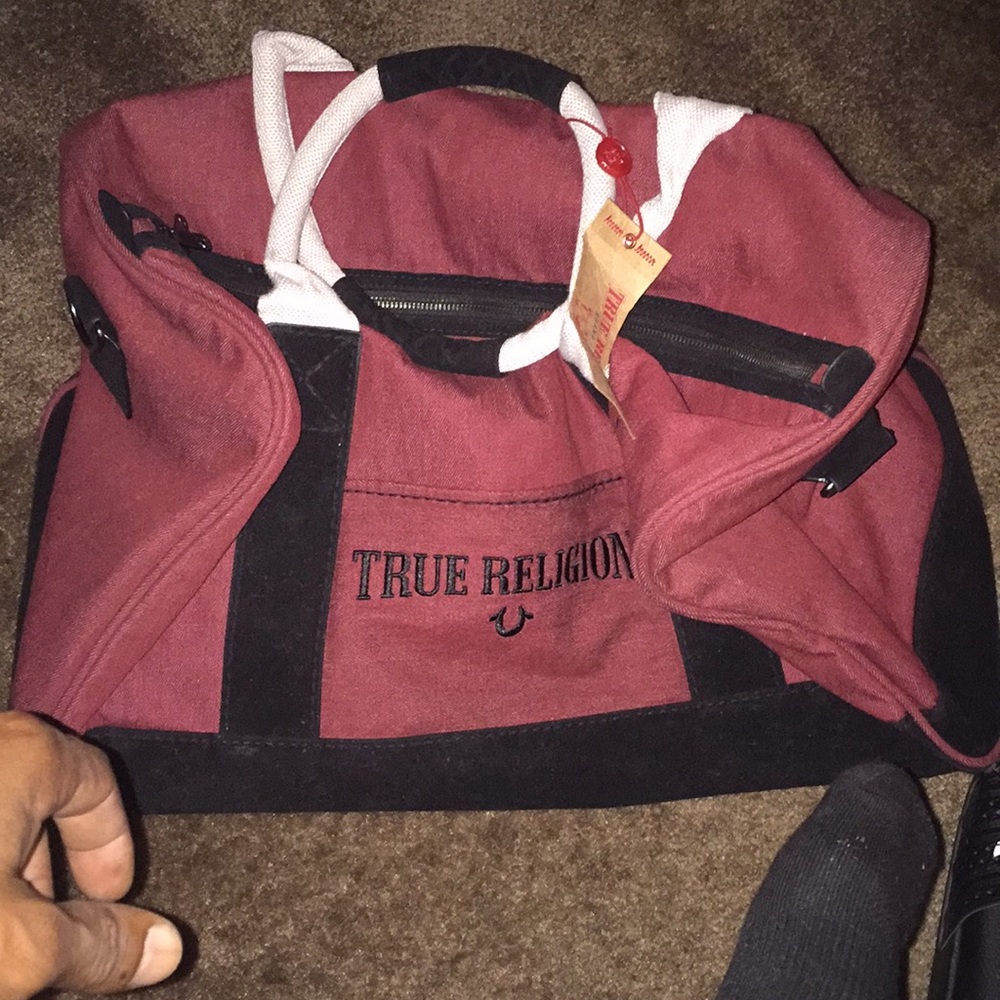 True religion duffle bag color red!